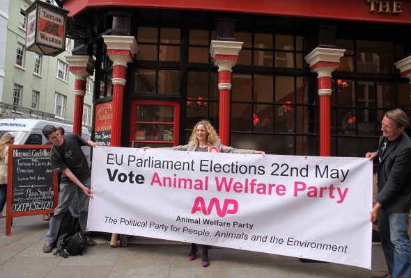 Soho pub, The Coach and Horses lends its support to the Animal Welfare Party’s EU election bid with a statement banner and staff decked out in AWP t-shirts